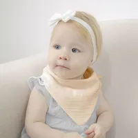 Set baveta cu doua fete din muselina cu jucarie dentitie BabyJem Bej