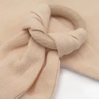Set baveta cu doua fete din muselina cu jucarie dentitie BabyJem Bej