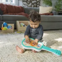 Музыкальная игрушка Baby Einstein Гавайская гитара foto