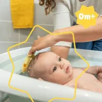 Силиконовая массажная щетка Badabulle для кожи головы младенца foto