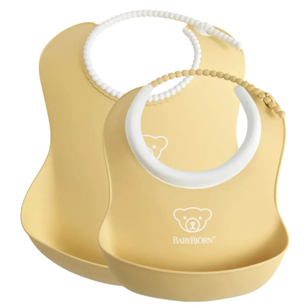 Set 2 bavete BabyBjorn Baby Feeding Set Powder Yellow foto
