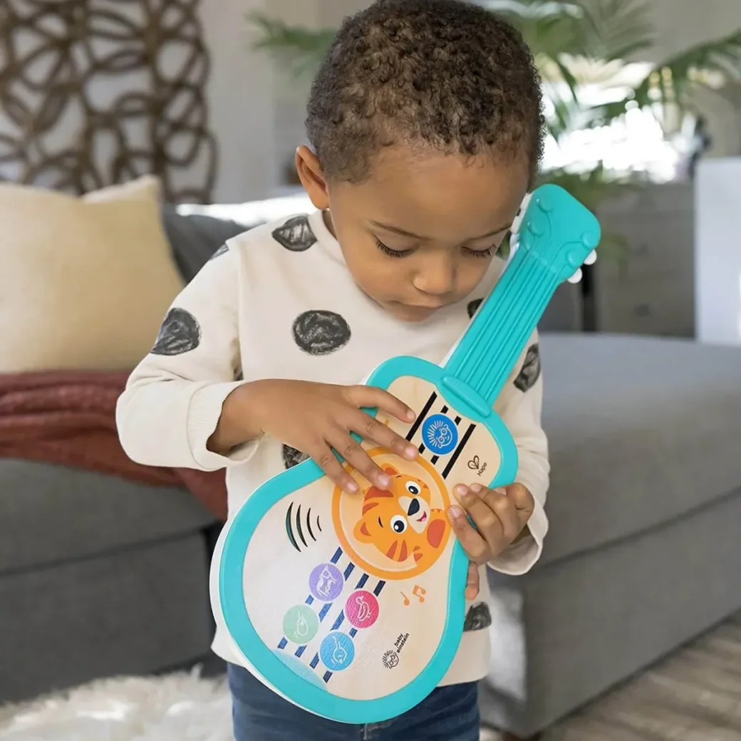 Музыкальная игрушка Baby Einstein Гавайская гитара foto