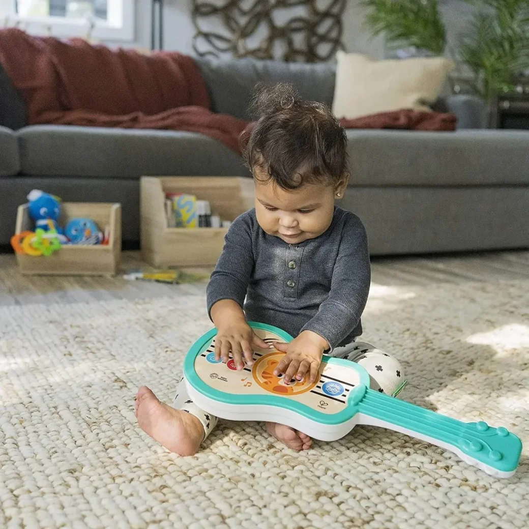 Музыкальная игрушка Baby Einstein Гавайская гитара foto