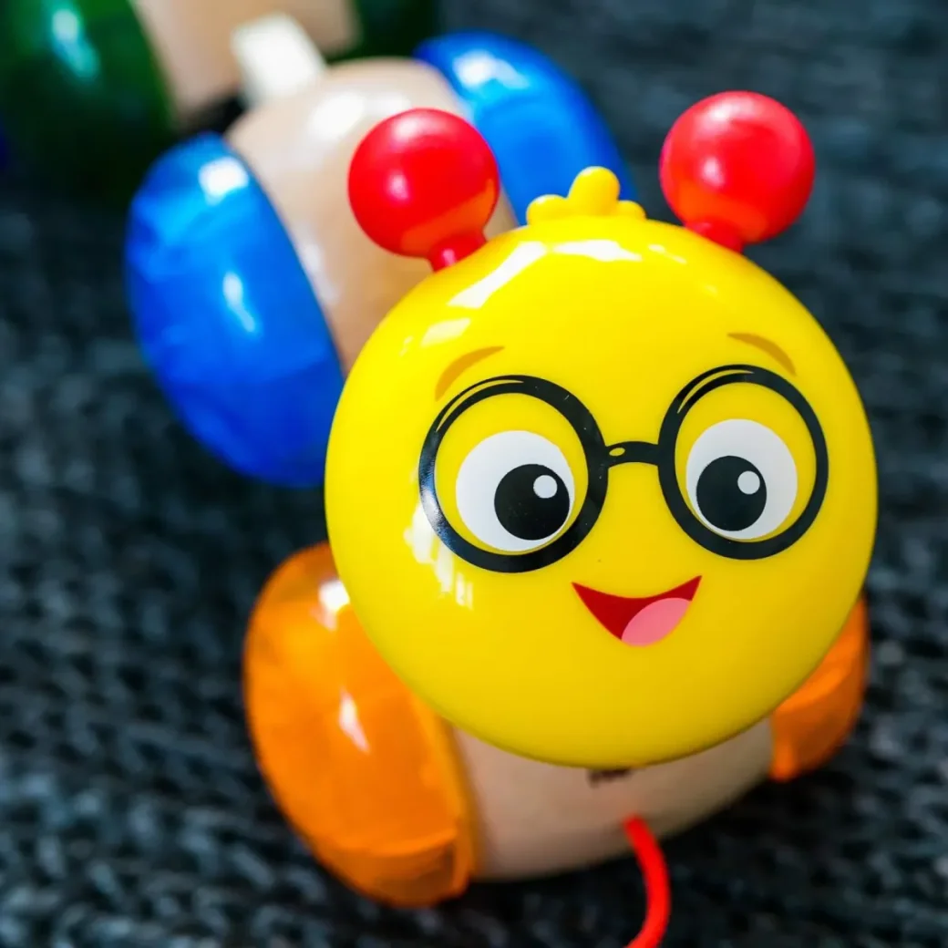 Игрушка деревянная Hape & Baby Einstein Inch Along Cal™ foto